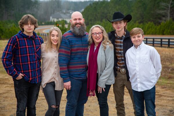 Sarah and Joel Koeppen with their children in February 2021.  PHIL SKINNER FOR THE ATLANTA JOURNAL-CONSTITUTION.