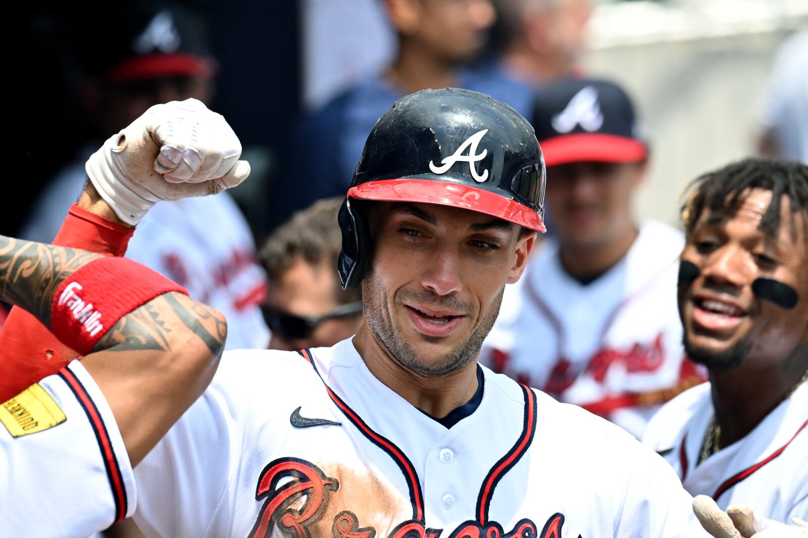 Atlanta Braves' first baseman Matt Olson (28) celebrates with teammates after hitting a solo home run during the fourth inning at Truist Park, Wednesday, August 2, 2023, in Atlanta. Atlanta Braves won 12-5 over Los Angeles Angels. (Hyosub Shin / Hyosub.Shin@ajc.com)