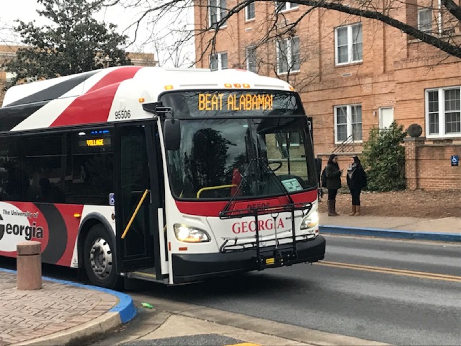 A University of Georgia bus echoes the sentiments of Bulldog Nation before Monday night's national championship showdown against the Alabama Crimson Tide. ERIC STIRGUS / ESTIRGUS@AJC.COM