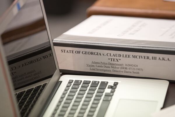 03/05/2018 — Atlanta, GA - A binder containing information pertaining to the Tex McIver case sits on the Fulton County District attorney’s desk during the first day of jury selection for the case before Fulton County Chief Judge Robert McBurney on Monday, March 5, 2018. ALYSSA POINTER/ALYSSA.POINTER@AJC.COM