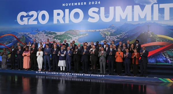 World leaders gather for a group photo during the G20 summit in Rio de Janeiro, Brazil, Tuesday, Nov. 19, 2024. (Leah Millis via AP, Pool)