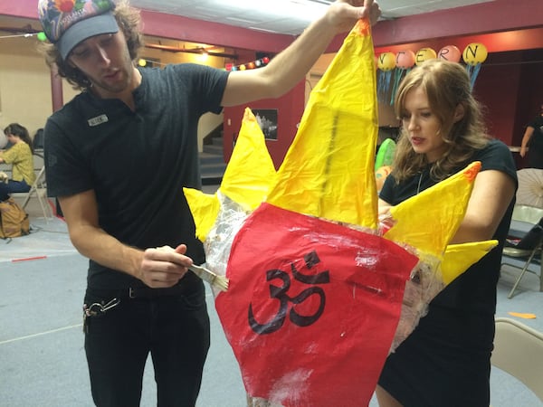 Nicholas Ward of the Fourth Ward and Dani Crane of Inman Park work on a paper lantern at a lantern-making workshop in advance of the BeltLine Lantern Parade in 2016. BO EMERSON/BEMERSON@AJC.COM