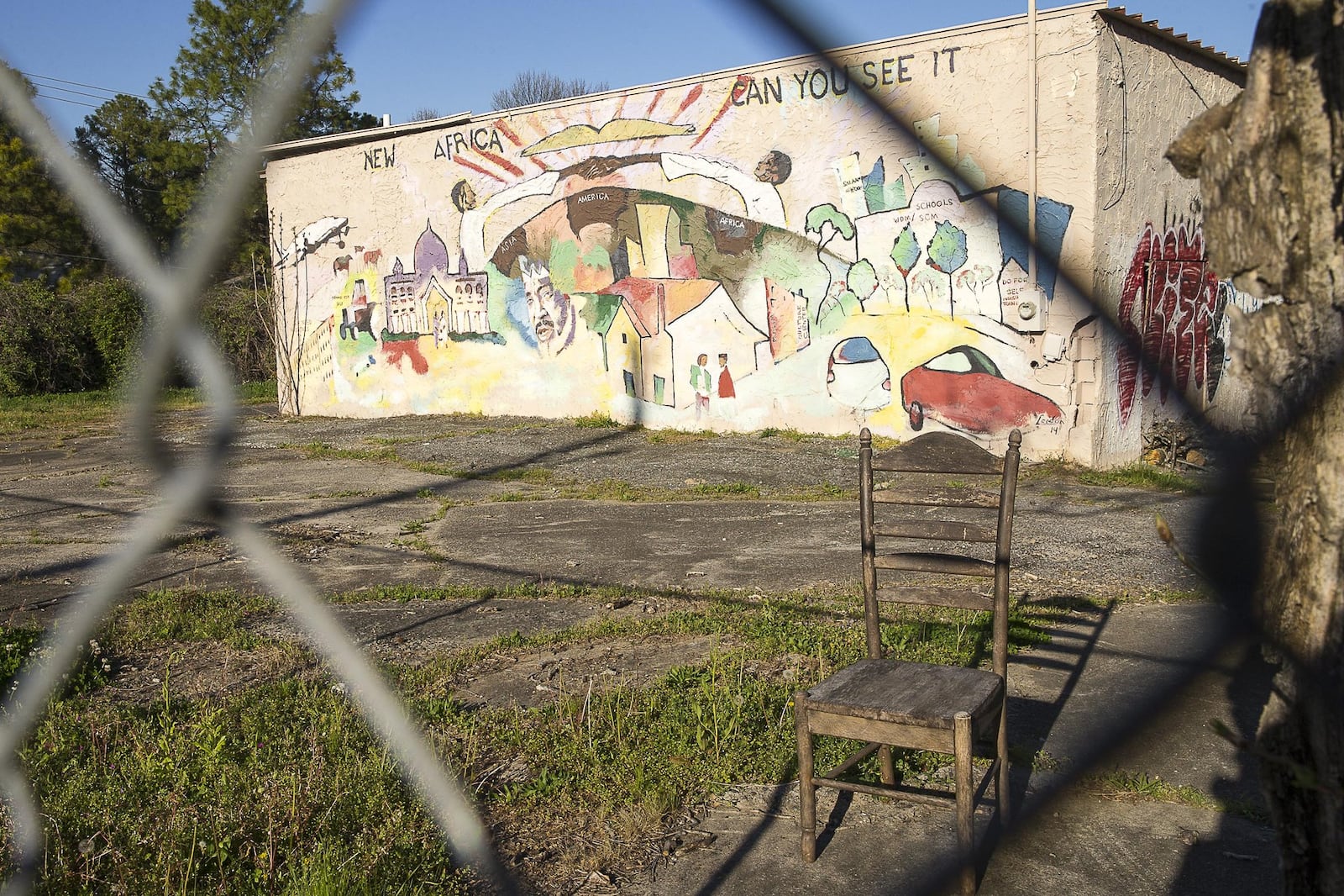 An abandoned building sits gated in the Peoplestown community. 