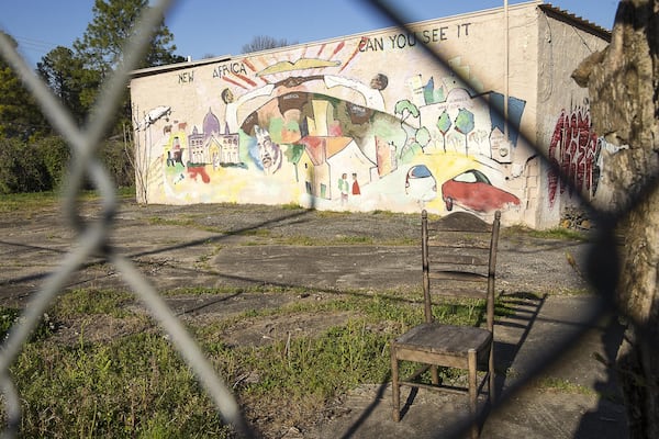 An abandoned building sits gated in the Peoplestown community. 