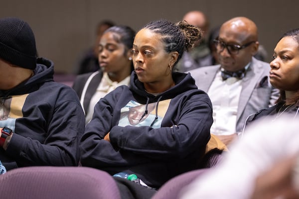 Darlene Chaney, cousin of Cornelius Taylor, listens to public comment in the council chamber at City Hall in Atlanta on Thursday, January 23, 2025. Speakers spoke on behalf of Taylor, who was killed when the city cleared the encampment he lived in last week. (Arvin Temkar / AJC)