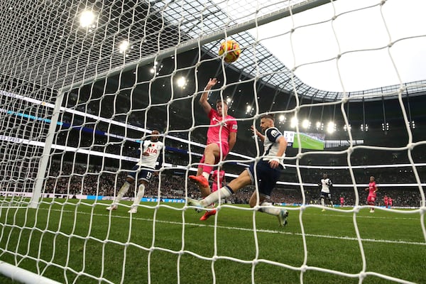 Ipswich Town's Liam Delap, centre, scores their side's second goal of the game during the Premier League match between Tottenham and Ipswich at Tottenham Hotspur stadium, London, Sunday Nov. 10, 2024. (Steven Paston/PA via AP)