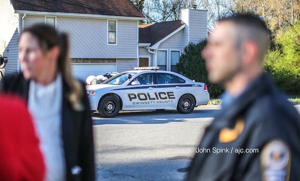 Gwinnett County police investigated a woman's death on Phil Niekro Parkway. JOHN SPINK / JSPINK@AJC.COM