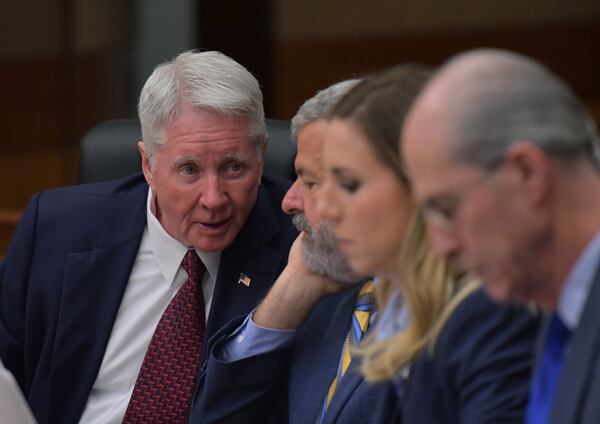 Tex McIver (left) confers with defense attorney Don Samuel during Day 7 of the Tex McIver murder trial in Fulton County Superior Court in Atlanta on Wednesday, March 21, 2018. (HYOSUB SHIN / HSHIN@AJC.COM)