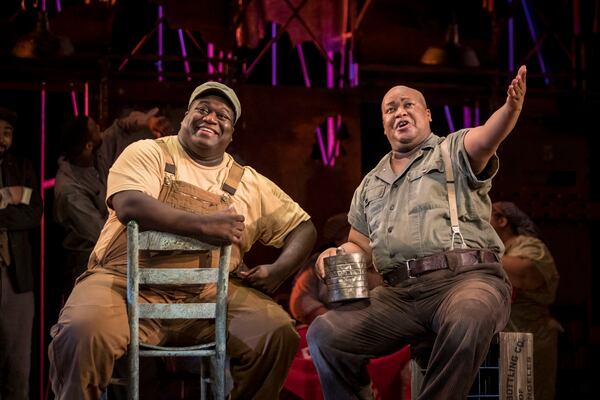 Reginald Smith Jr. performs as Jake and Musa Ngqungwana performs as Porgy in the Atlanta Opera’s production of “Porgy and Bess.”  Ngqungwana and Morris Robinson alternate as Porgy in different performances of the opera during its run at Cobb Energy Performing Arts Centre through March 15. (Rafterman Photography)