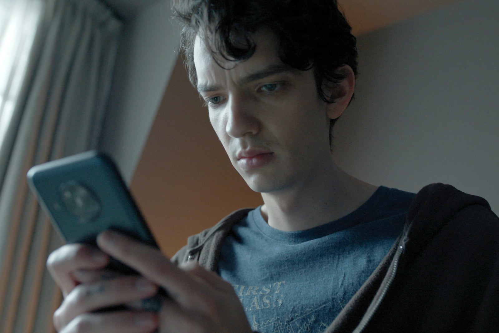 This image released by Apple TV+ shows Kodi Smit-McPhee in a scene from "Disclaimer." (Apple TV+ via AP)