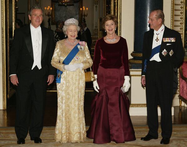 LONDON - NOVEMBER 19: HRH Queen Elizabeth II (2nd from L), U.S. President George W. Bush (L), First Lady Laura Bush and HRH the Duke of Edinburgh pose in the music room at Buckingham Palace on November 19, 2003 in London. The Queen was hosting a State Banquet at the Palace for the President and his wife, on the first official day of his 3-day visit to Britain. (Photo Royal Rota/Getty Images)