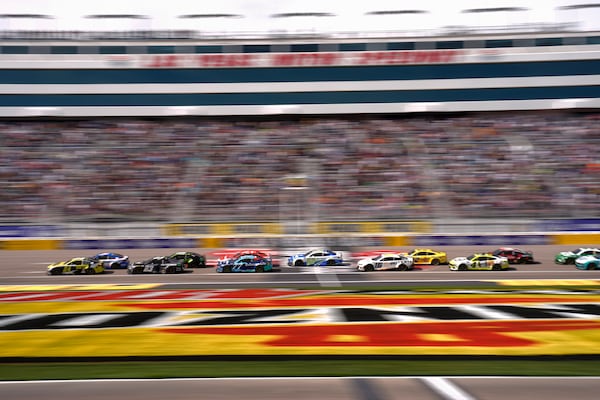 Drivers restart racing after a yellow flag during a NASCAR Cup Series auto race Sunday, March 16, 2025, in Las Vegas. (AP Photo/John Locher)