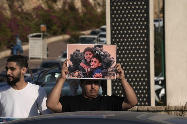 Palestinian citizens of Israel protest against Israel's military operations in the Gaza Strip and Lebanon, in Umm Al-Fahm, Israel, Saturday, Nov. 9, 2024. (AP Photo/Mahmoud Illean)