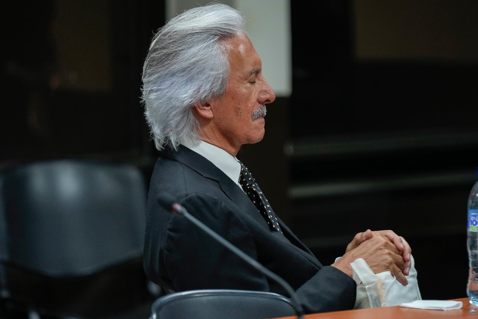 Guatemalan journalist Jose Ruben Zamora, founder of El Periodico newspaper, jailed for more than two years on money laundering charges, reacts to a judge granting him house arrest, in Guatemala City, Friday, Oct. 18, 2024. (AP Photo/Moises Castillo)