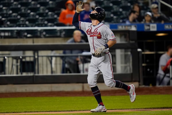 Atlanta Braves' Dansby Swanson runs the bases after hitting a three-run home run during the third inning of a baseball game against the New York Mets Tuesday, June 22, 2021, in New York. (AP Photo/Frank Franklin II)