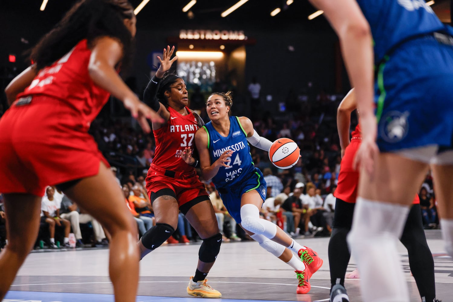 Minnesota Lynx forward Napheesa Collier (24) dribbles against Atlanta Dream forward Cheyenne Parker-Tyus (32) during the second half at Gateway Center Arena, Sunday, May 26, 2024, in Atlanta. (Miguel Martinez / AJC)