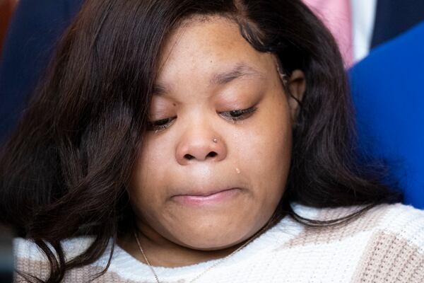 A tear rolls down Jessica Ross’ cheek during a February press conference about her baby, who was decapitated during delivery. (Ben Gray / Ben@BenGray.com)