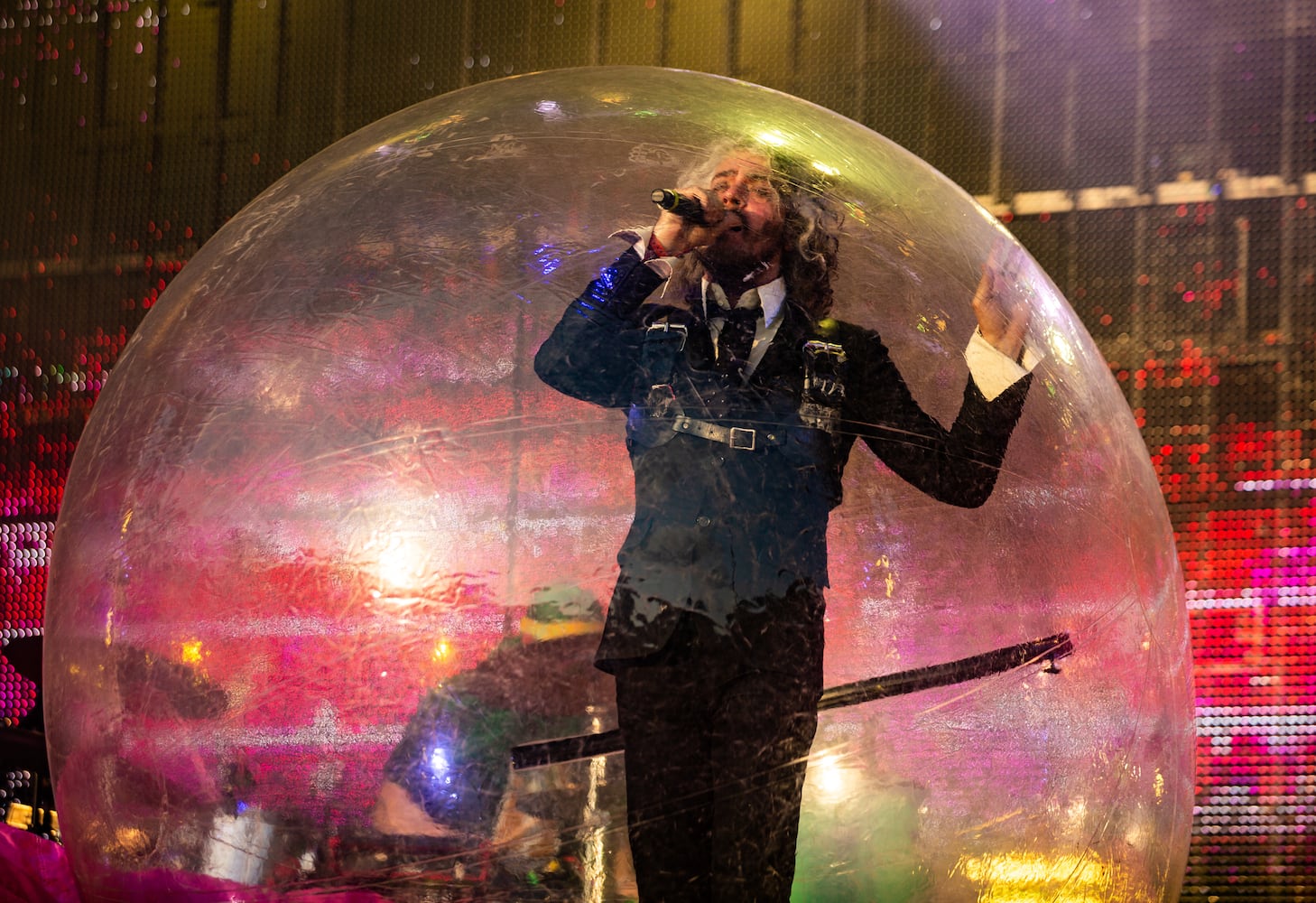 The Flaming Lips, featuring the lead singer in a bubble and inflatable giant robots on the Piedmont Stage, perform on the final day of the Shaky Knees Music Festival at Atlanta's Central Park on Sunday, May 7, 2023. (RYAN FLEISHER FOR THE ATLANTA JOURNAL-CONSTITUTION)