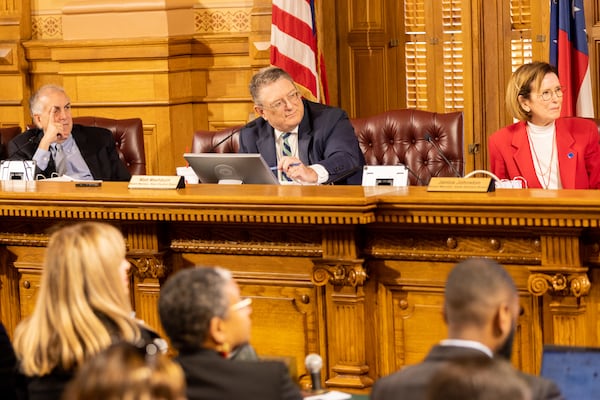 The State Election Board meets at the Capitol in Atlanta on Tuesday, December 19, 2023. Pictured, left to right: Edward Lindsey, Matthew Mashburn and Janice Johnston. (Arvin Temkar/arvin.temkar@ajc.com)