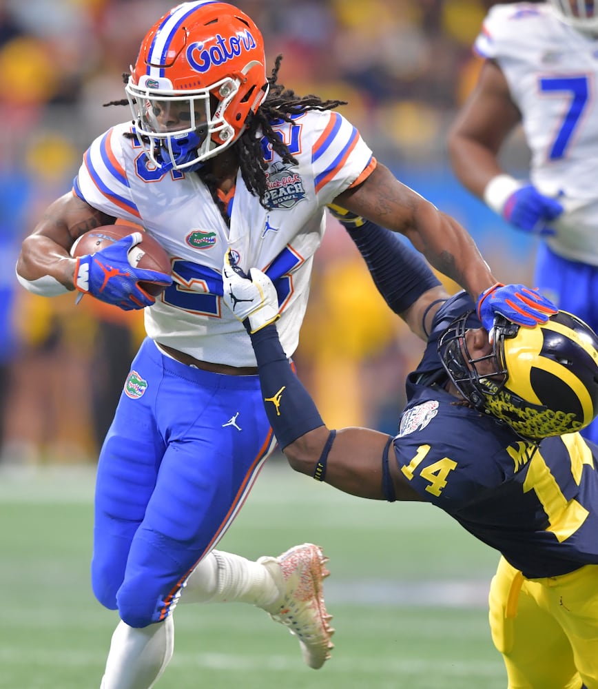 Photos: Florida, Michigan clash in Chick-fil-A Peach Bowl