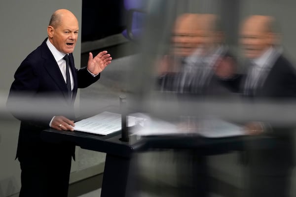 German Chancellor Olaf Scholz delivers his government statement in the German parliament Bundestag in Berlin, Germany, Wednesday, Nov. 13, 2024. (AP Photo/Markus Schreiber)