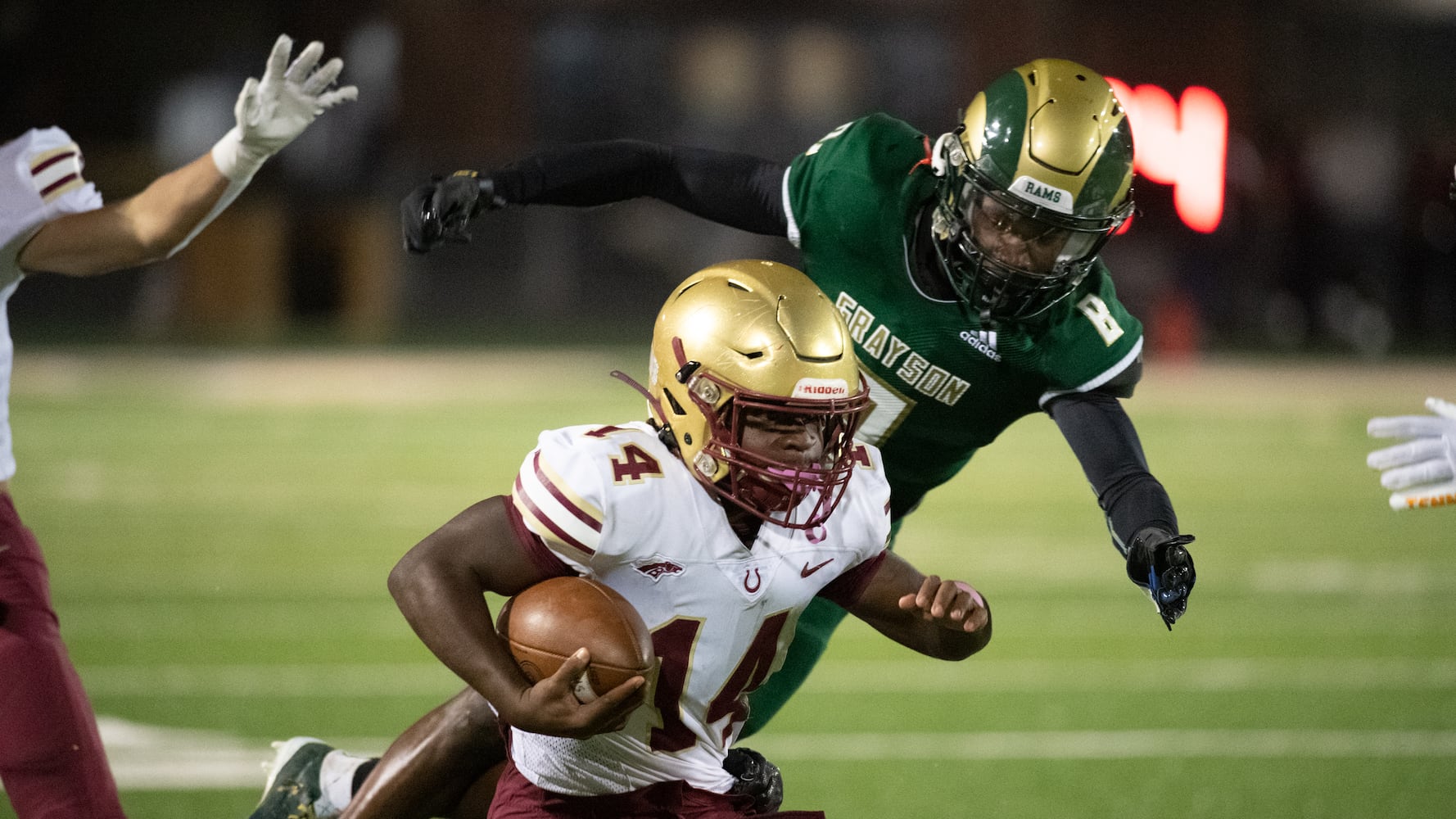 Cameron French, running back for Brookwood, is tackled. (Jamie Spaar for the Atlanta Journal Constitution)