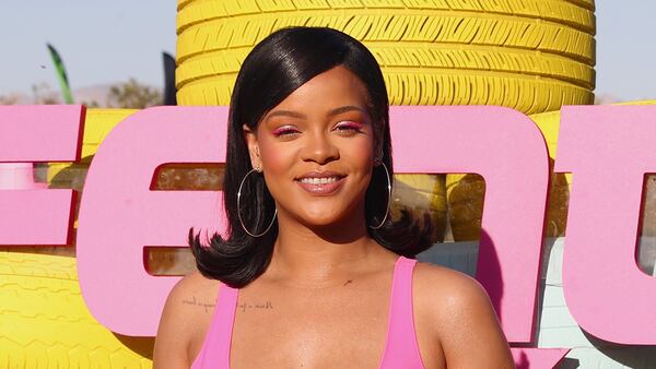 Rihanna is on the cover of Vogue's May issue and spoke to the magazine about her makeup and lingerie line, love life and body image.  (Photo by Joe Scarnici/Getty Images for PUMA)