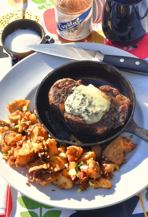 Buffalo Filet and Potatoes for One. The flavor combo of hot sauce and blue cheese has been adapted to many foods. Here we apply it to steak and home fries for one. Styling by Wendell Brock / Chris Hunt for the AJC