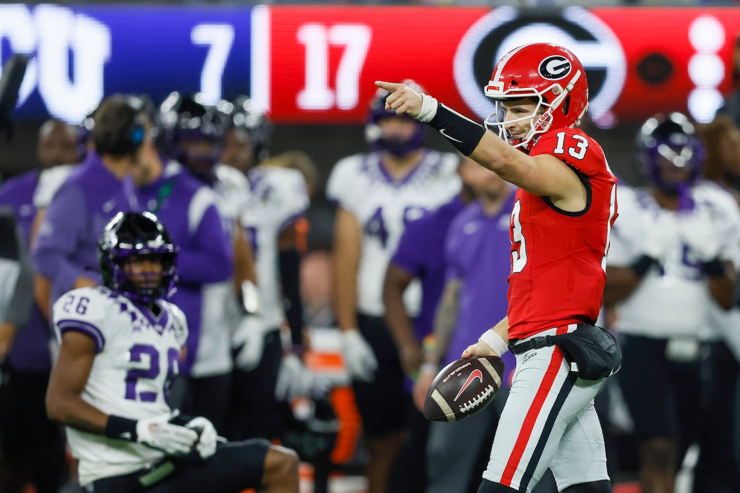 Georgia Bulldogs quarterback Stetson Bennett (13) reacts after a first down run against the TCU Horned Frogs during the first half of the College Football Playoff National Championship at SoFi Stadium in Los Angeles on Monday, January 9, 2023. (Jason Getz / Jason.Getz@ajc.com)