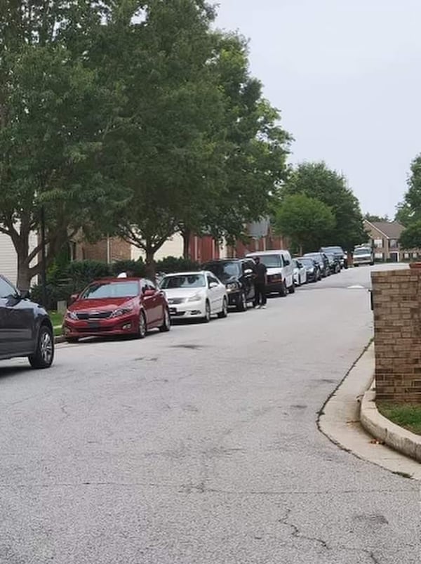 Cars are lined up outside the home of Erika and Will Harrington, where they served customers their popular chicken tenders before opening their brick-and-mortar location of Jaybee's Tenders in 2020, at Snapfinger Road in Decatur.