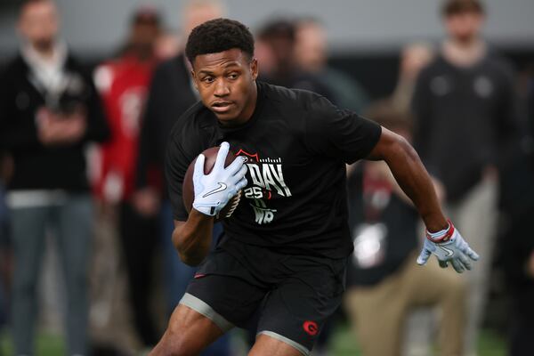 Georgia's Arian Smith runs a drill during the school's NFL Pro Day, Wednesday, March, 12, 2025, in Athens, Ga. (AP Photo/Colin Hubbard)