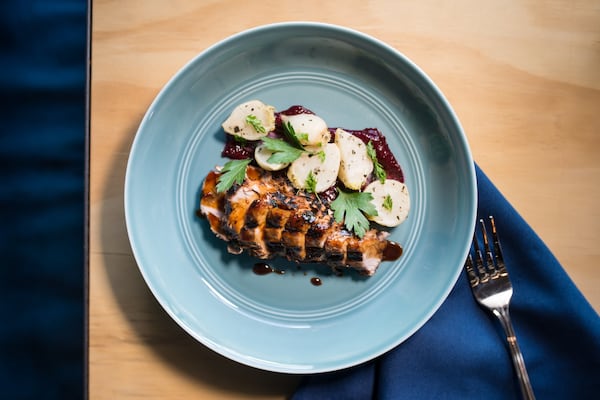 Pork Tenderloin with cranberry mostarda, rosemary turnips, and apple cider jus. Photo credit- Mia Yakel.