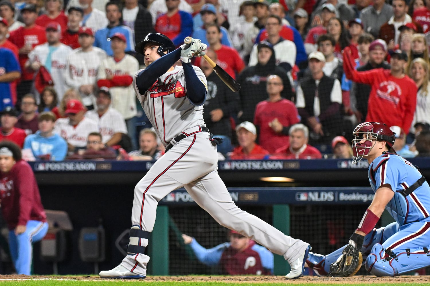 Atlanta Braves’ Austin Riley hits a solo home run against the Philadelphia Phillies during the fourth inning of NLDS Game 4 at Citizens Bank Park in Philadelphia on Thursday, Oct. 12, 2023.   (Hyosub Shin / Hyosub.Shin@ajc.com)