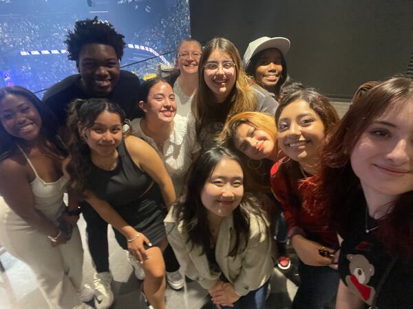 Bilingual students with SUNE Translate pose for a group photo. The nonprofit has 45 interpreters with 12 languages represented. Courtesy of Suann Kim