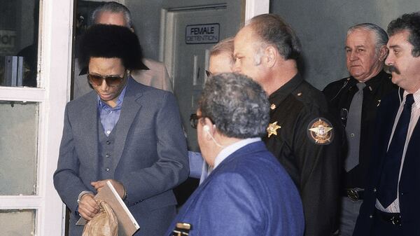 Convicted killer Wayne Williams is pictured leaving court during one of his pre-trial proceedings in 1992. Williams, now 60, is serving life in prison in the murders of Nathaniel Cater, 27, and Jimmy Ray Payne, 21, who were among about 29 black men and boys slain in the Atlanta area during a 23-month killing period from 1979 to 1981 in and around Atlanta. The series of killings, the majority of which were of children, became known as the Atlanta child murders. Williams was never convicted of any of the children’s slayings.