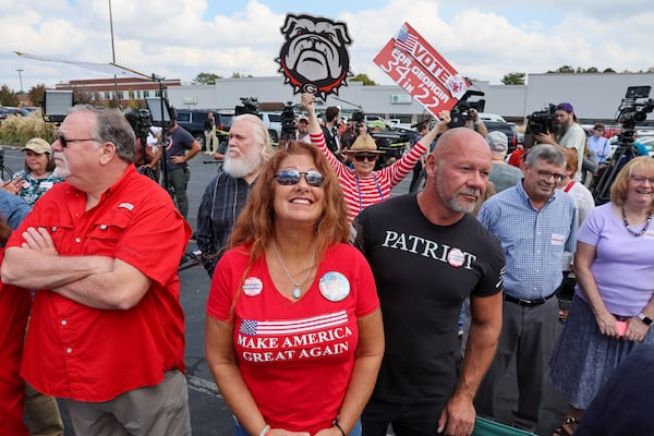 Hundreds of people turned out to see Republican U.S. Senate hopeful Supporters wait for Republican senate hopeful Herschel Walker at a rally Tuesday in Carrollton. (Arvin Temkar / arvin.temkar@ajc.com)