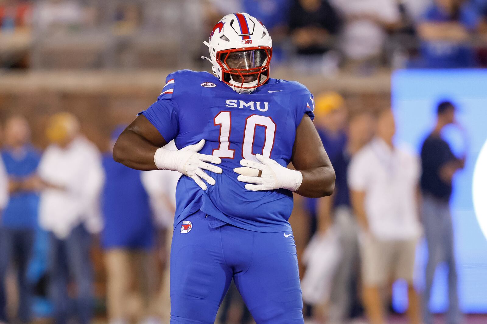 SMU defensive tackle Anthony Booker Jr. (10) celebrates during the first half of an NCAA college football game against SMU in Dallas, Saturday, Nov. 2, 2024. (AP Photo/Gareth Patterson)