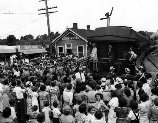 President Franklin Roosevelt's train arrives from Washington D.C. at Warm Springs in the 1940s, where he spent time at 'The Little White House.'