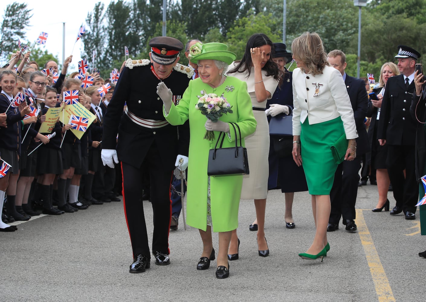 Photos: Meghan Markle stuns at first solo outing with Queen Elizabeth