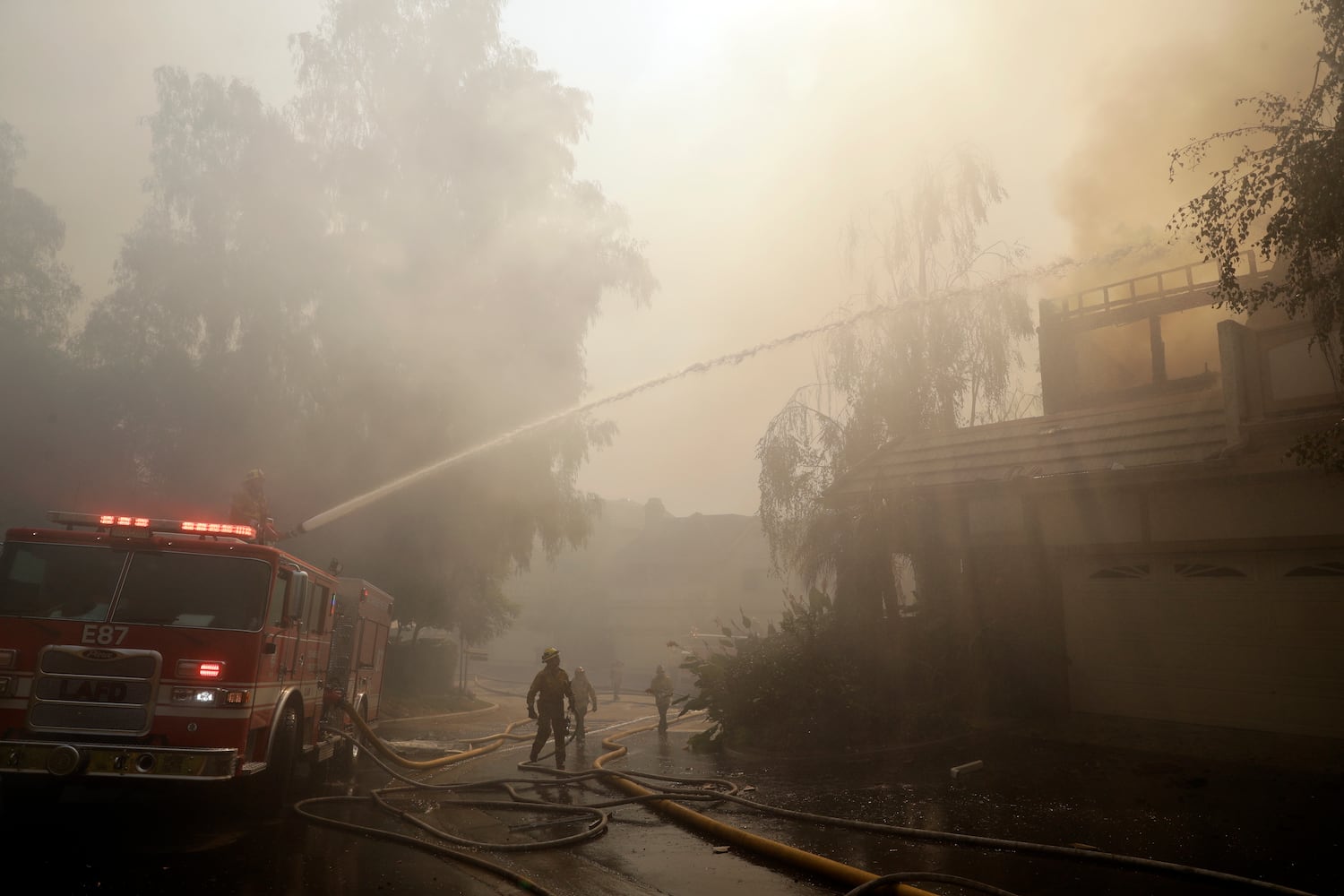 Photos: Deadly wildfires blaze through northern, southern California