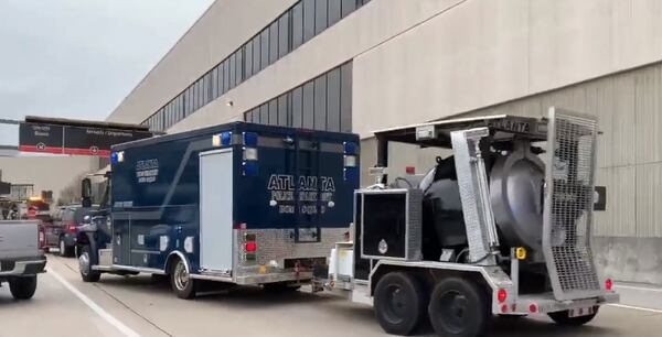 An Atlanta Police Department bomb squad unit was called to Hartsfield-Jackson International Airport on Friday after a suspicious package was reported in baggage claim. (Photo: Channel 2 Action News)