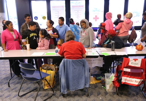 September 10, 2017 Albany: Local residents fill the lobby to check in to the Red Cross shelter at the Albany Civic Center to ride out Hurricane Irma on Sunday, September 10, 2017, in Albany.