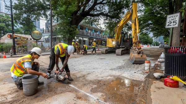 Crews continue work where a water main burst near Midtown's West Peachtree and 11th streets.