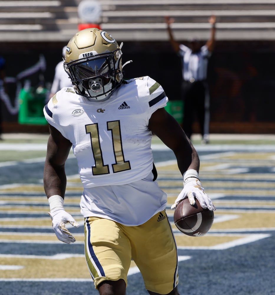 Georgia Tech running back Jamal Haynes (11) scores a touchdown in the first quarter during the Spring White and Gold game at Bobby Dodd Stadium at Hyundai Field In Atlanta on Saturday, April 13, 2024.   (Bob Andres for the Atlanta Journal Constitution)