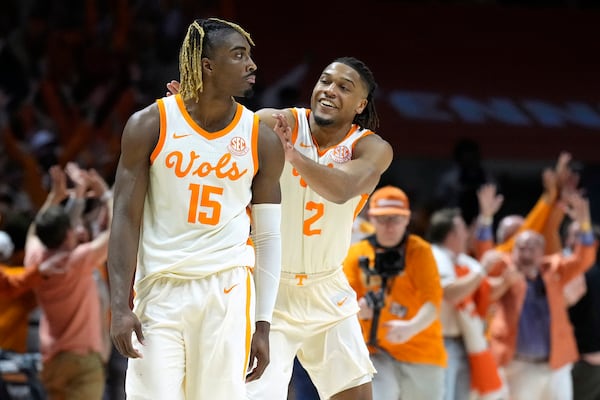 Tennessee guard Jahmai Mashack (15) is congratulated by Chaz Lanier (2) after scoring the winning 3-point basket as time expired in an NCAA college basketball game against Alabama, Saturday, March 1, 2025, in Knoxville, Tenn. (AP Photo/Mark Humphrey)