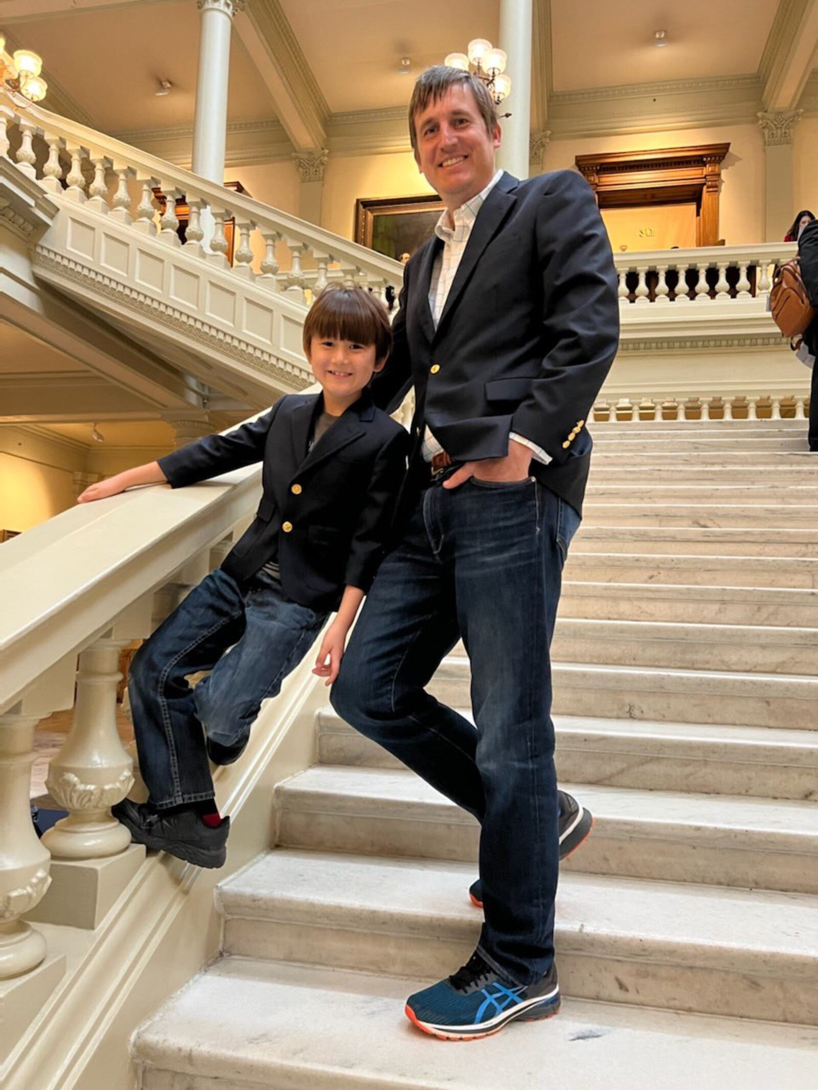 Democrat Russell Edwards, shown with and his 8-year-ol son Teddy, was among the last of the candidates to qualify Friday at the Georgia Capitol. The Athens-Clarke County commissioner is running for the Public Service Commission. (Courtesy of State Rep. Spencer Frye).