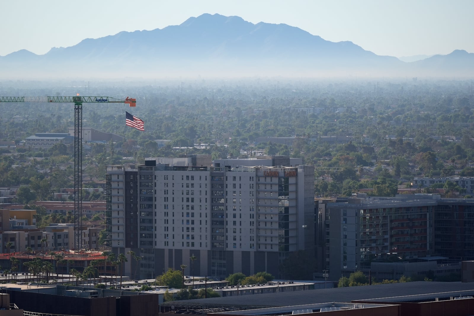 New buildings are going up Tuesday, Sept. 24, 2024, in Tempe, Ariz. (AP Photo/Ross D. Franklin)