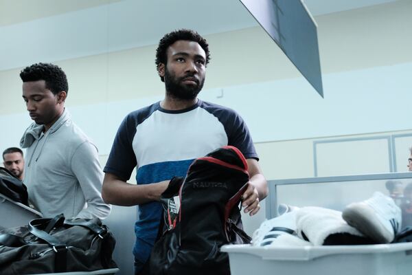  ATLANTA Robbin' Season -- "Crabs in a Barrel" -- Season Two, Episode 11 (Airs Thursday, May 10, 10:00 p.m. e/p) Pictured: RJ Walker as Clark County, Donald Glover as Earnest Marks. CR: Guy D'Alema/FX