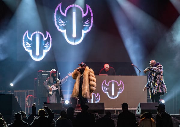 The Peach Drop returns to Underground Atlanta with a free concert including Big Boi as the headliner on Tuesday, Dec 31, 2024.  Big Boi, fur coat, is on stage with Sleepy Brown. (Jenni Girtman for The Atlanta Journal-Constitution)