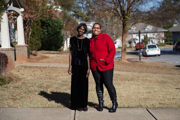 Cherry Glover (left), who has a developmental disability, and AADD caseworker Dionne Walker have worked together for several years now. Besides helping Glover with “life skills training” and tracking her progress, Walker assisted Glover in compiling her family’s wish list for the Adopt-a-Family program. BRANDEN CAMP / SPECIAL